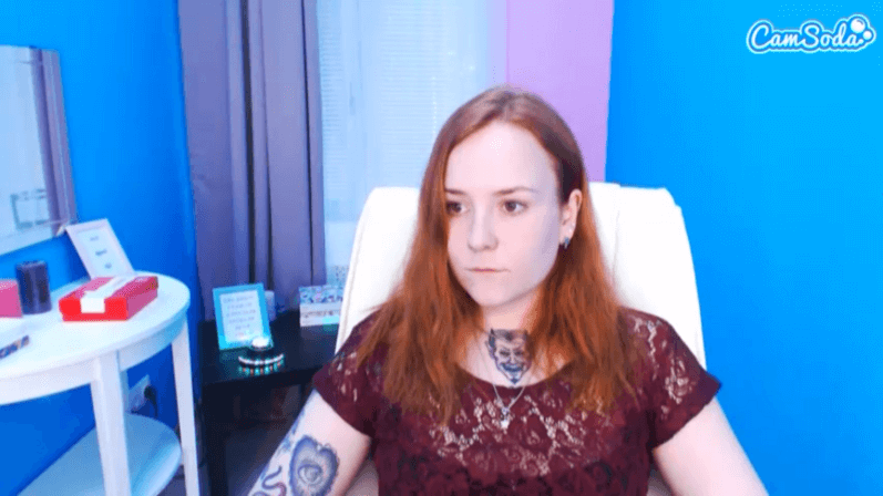 Cute ginger with devil neck tattoo on CamSoda