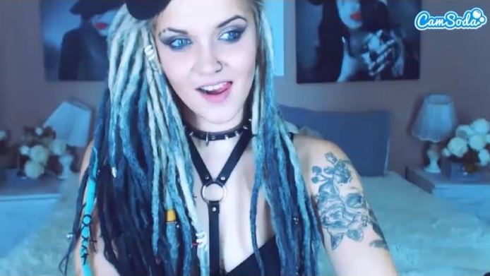 Young tattooed and collared cam babe with blue dreadlocks on CamSoda