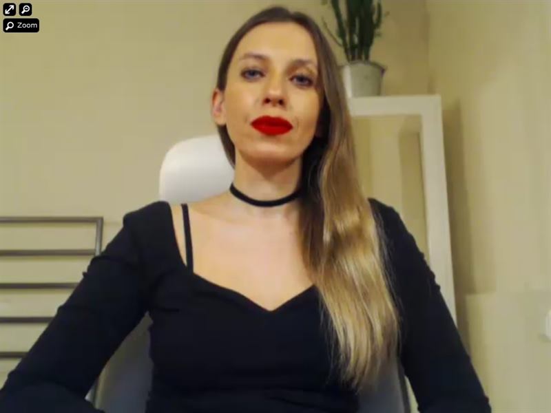 Thin blonde domme looking down at her slaves on xLoveCam